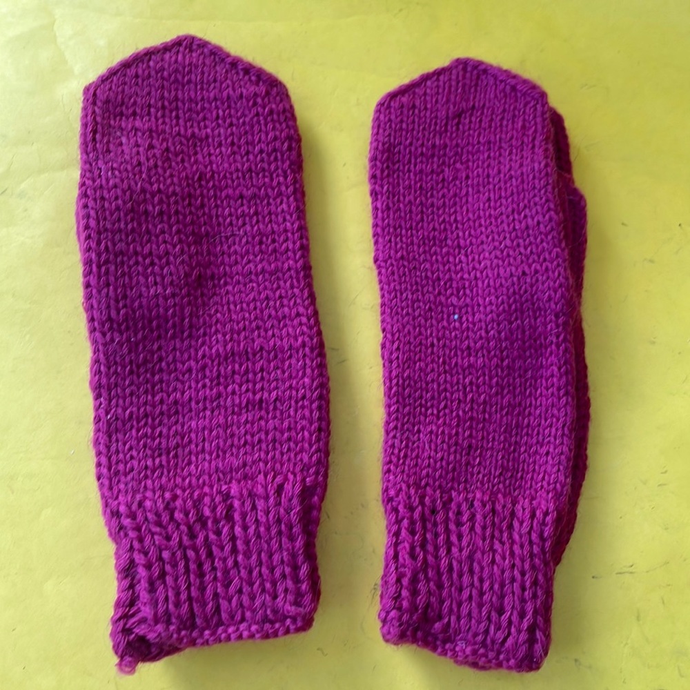 Crimson knitted wool mittens